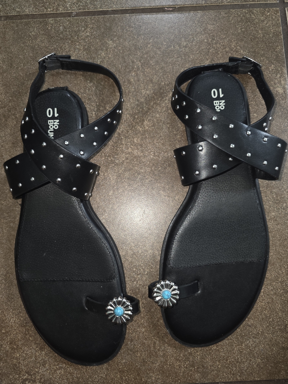 No Boundaries Black Studded Crisscross Sandals with Turquoise Flower Accent